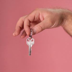 Person holding a key